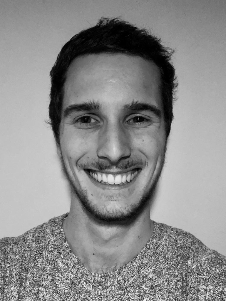 Black and white headshot of young Caucasian male.