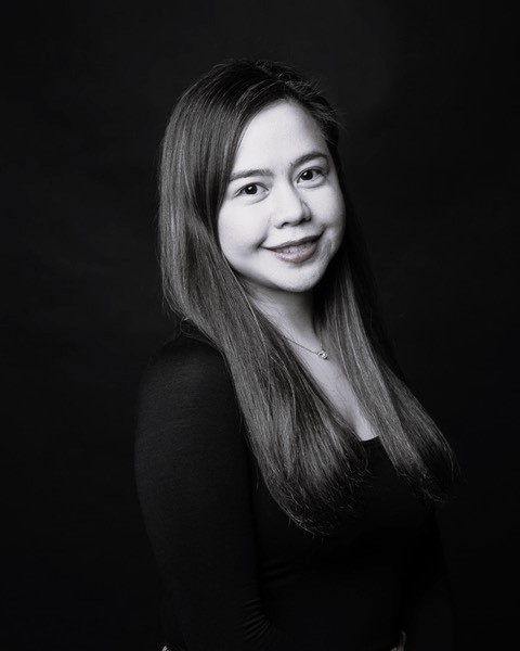 A portrait picture of Louissa in black and white.