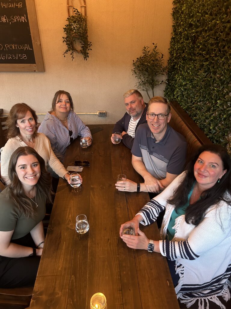 The management team enjoying a drink after annual planning.